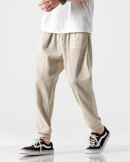 Calças estilo jogger de linho com cintura ajustável