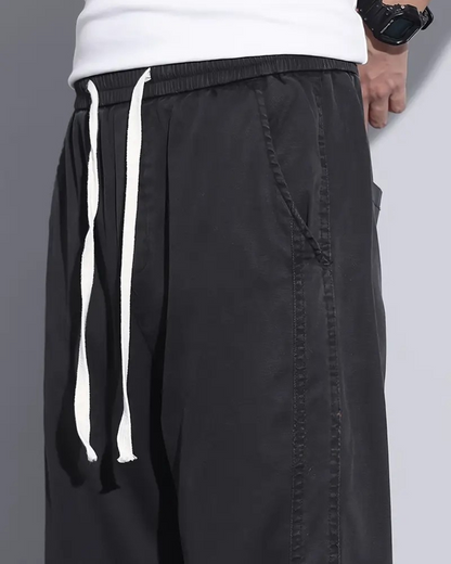 Calças casuais leves de perna larga para homem