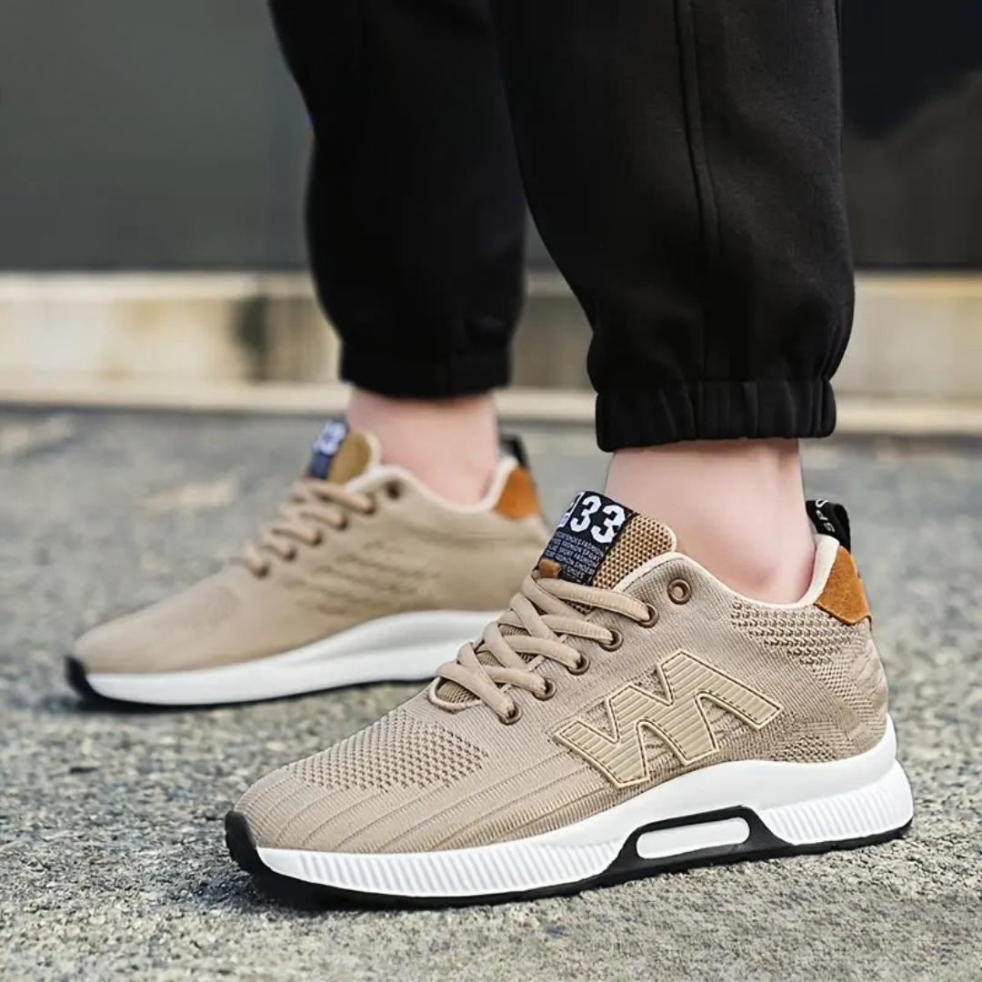 Sapatos desportivos de malha com sola alta para homem