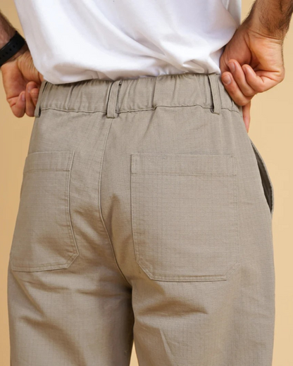 Calças casuais com ajuste de botões para homem