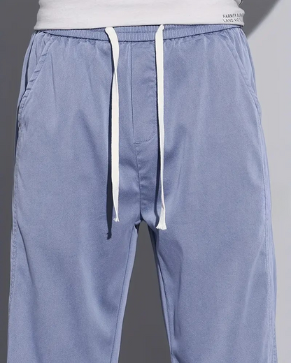 Calças casuais leves de perna larga para homem