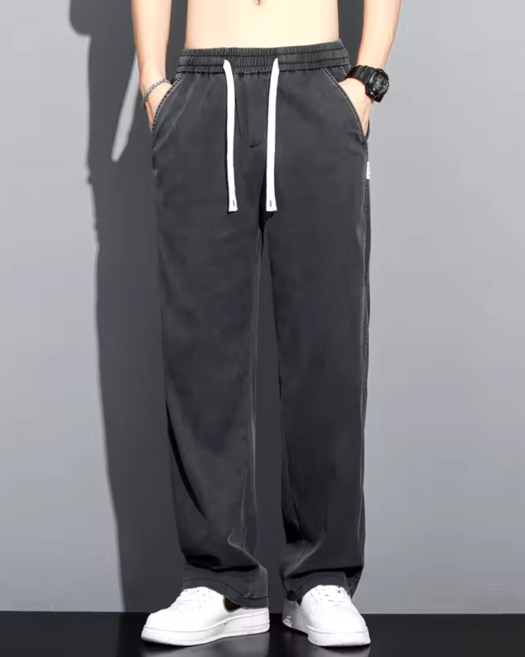 Calças casuais leves de perna larga para homem